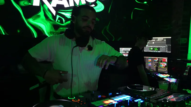 Ajay on the decks under green light