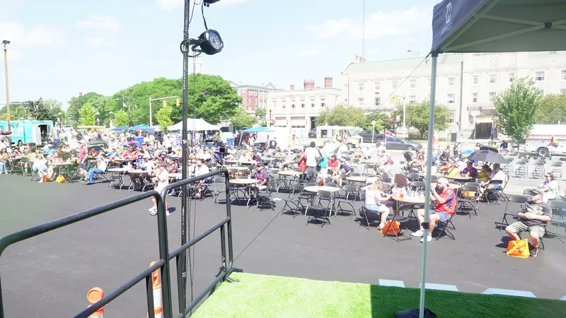 An outdoor festival crowd from the stage